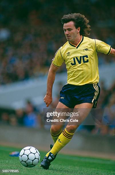 Scottish footballer Charlie Nicholas of Arsenal, in action against Celtic at Celtic Park, Glasgow, 1st August 1987. Arsenal won the match 5-1.