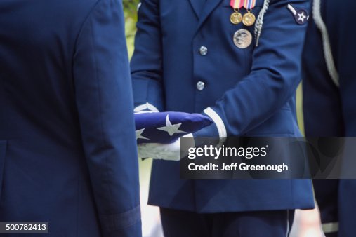 Military Rites Soldiers Folding Flag At Military Funeral High-Res Stock Photo - Getty ...