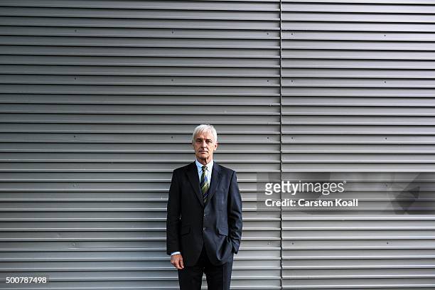 Volkswagen Group Chairman Matthias Mueller poses for a photograph after a press conference to announce the latest update in the company's handling of...