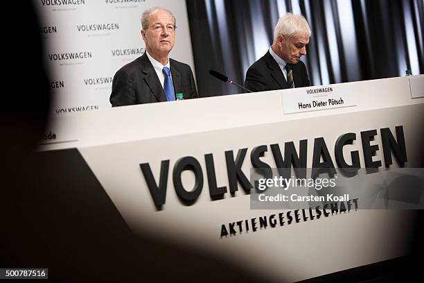 Hans Dieter Poetsch , Chairman of the Supervisory Board of Volkswagen AG, and Volkswagen Group Chairman Matthias Mueller , attend a press conference...