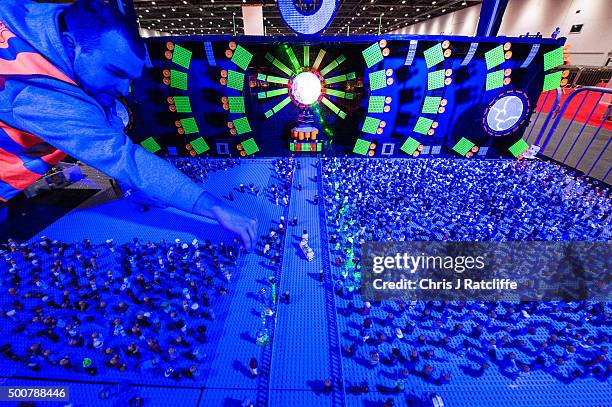 Lego builder Nick Morrey places Lego people on his Ultra WMC Music Festival scene, a event held every year in Miami, with over 3000 Lego people and...