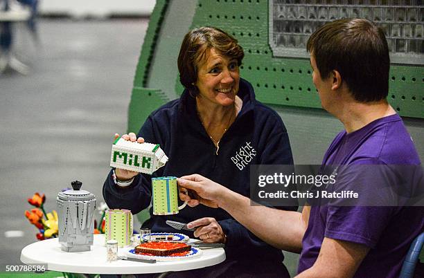 Husband and wife Annie Diment and Ed Diment, enjoy a Lego lunch outside the caravan they built entirely from Lego with 215,158 bricks over 1000 hours...