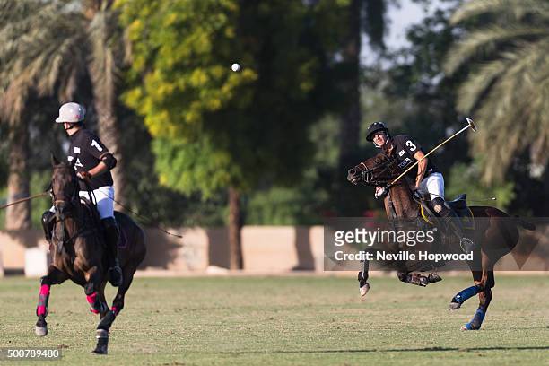Tomas Iriarte of Habtoor polo team, hits an arial ball down field on the third day of the Cartier International Dubai Polo Challenge 11th edition at...