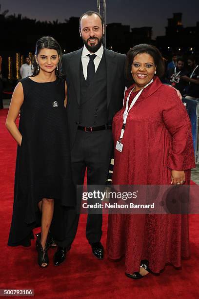 Actors Ahd Kamel, Ali Suliman and guest attend the "Zinzana " premiere during day two of the 12th annual Dubai International Film Festival held at...