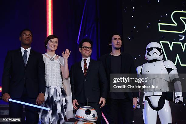 John Boyega, Daisy Ridley, J.J. Abrams, BB-8, Adam Driver and Stormtrooper attend the 'Star Wars: The Force Awakens' fan event at the Roppongi Hills...