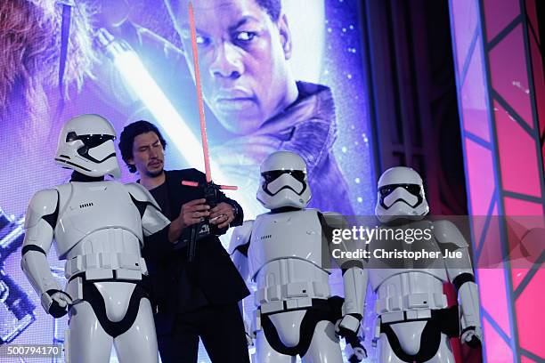 Adam Driver and Stormtroopers attend the 'Star Wars: The Force Awakens' fan event at the Roppongi Hills on December 10, 2015 in Tokyo, Japan.