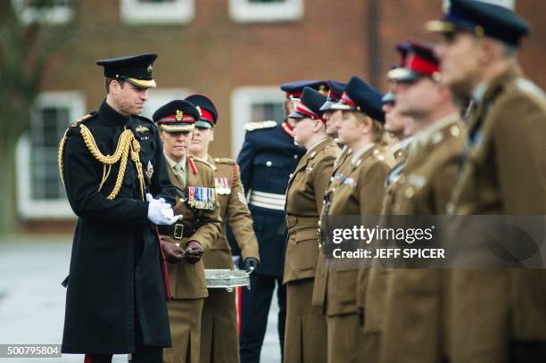 Britain's Prince William, Duke of Cambridge, presents the Government Ebola Medal for Service in West Africa during the 2014/15 Ebola outbreak to...