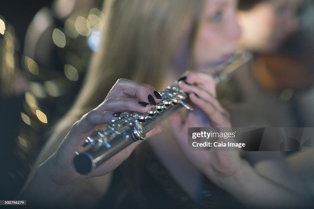 Close up of flutist performing