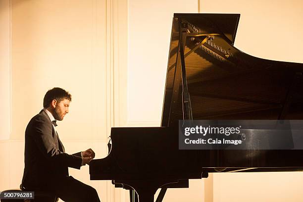 pianist performing - concert pianist stock pictures, royalty-free photos & images