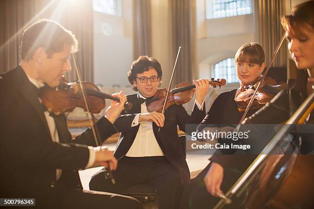 classical quartet performing - musical quartet stock pictures, royalty-free photos & images