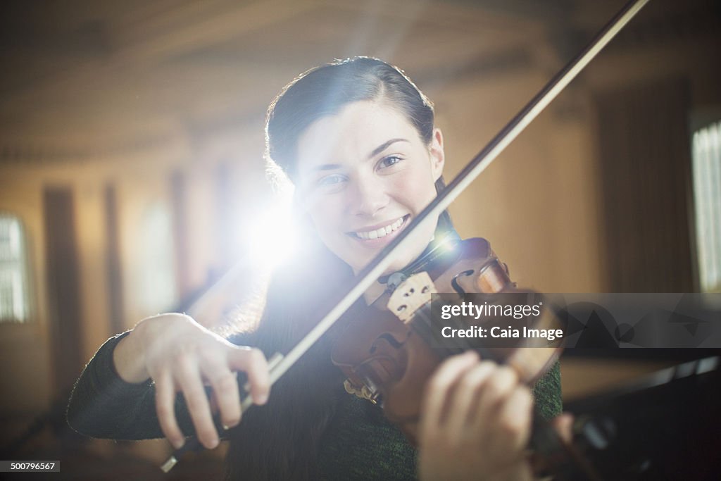 Portrait of violinist performing