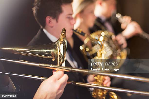 orchestra performing - trombone stockfoto's en -beelden