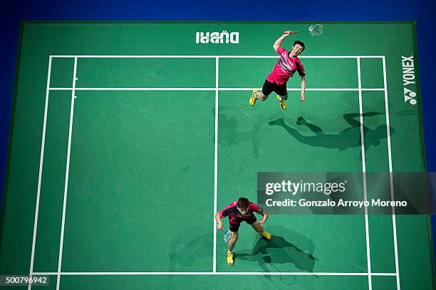 Lee Yong Dae and Yoo Yeon Seong of Korea in action in the Men's Doubles match against Mohammad Ahsan and Hendra Setiawan of Indonesia during day two...