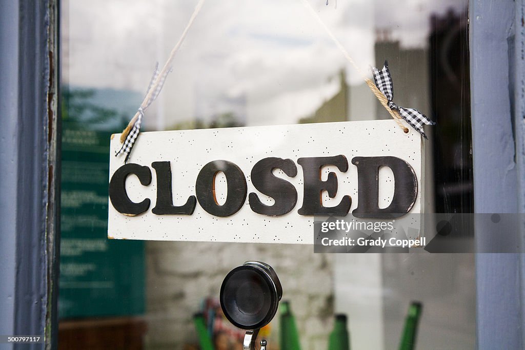 Closed sign in shop window