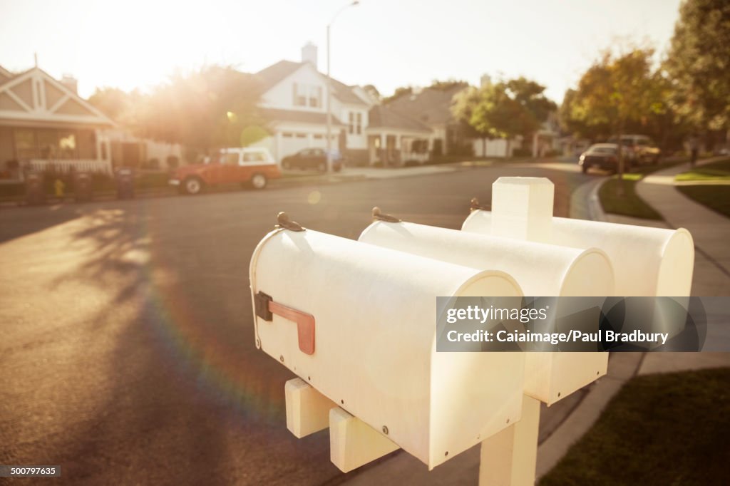 Mailboxes on suburban street