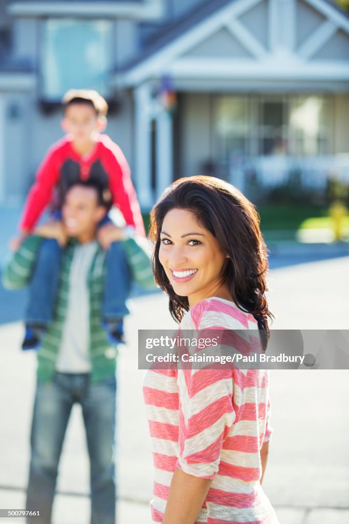 Portrait of smiling woman on street