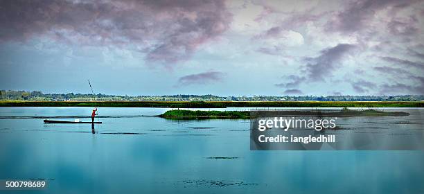 thailand, khon kaen, picture of man fishing - khon kaen stock-fotos und bilder