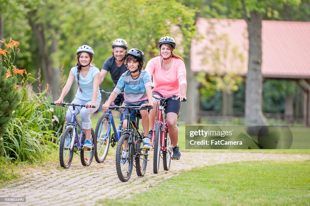 Family Enjoying a Bike Ride Together