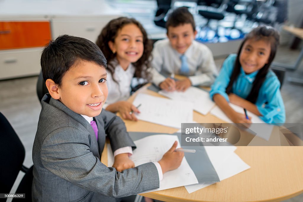 Kids in a business meeting