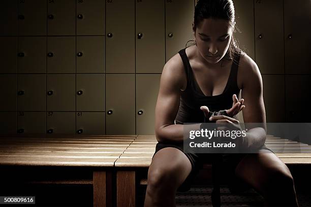 female fighter preparing for training session - woman backstage stock pictures, royalty-free photos & images