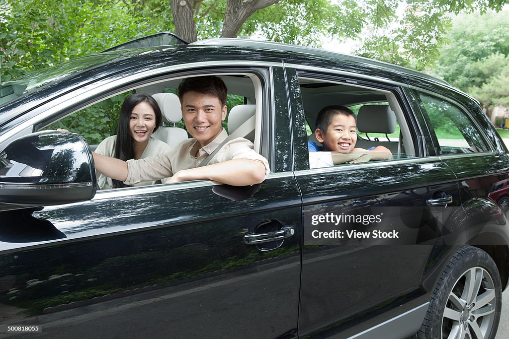 Boy with his parents on travel