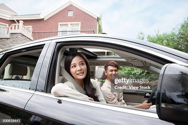 young couple - asian couple car stockfoto's en -beelden