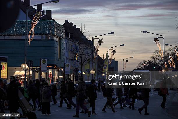 People walk in the city center on December 10, 2015 in Wolfsburg, Germany. Wolfsburg is the base for the car manufactury Volkswagen group. Volkswagen...