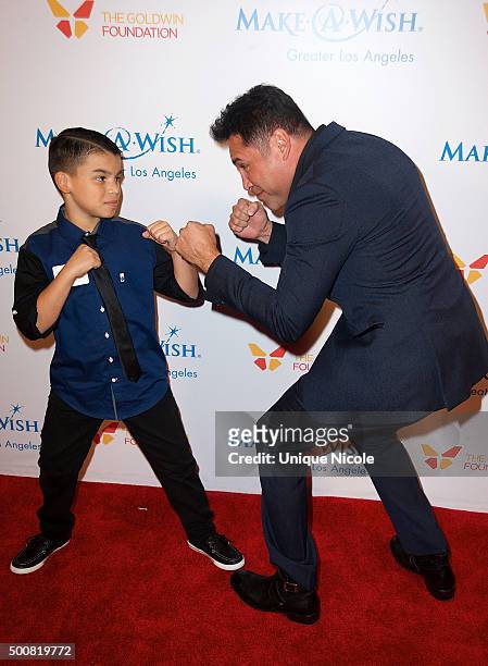 Oscar De La Hoya and 'wish kid' arrive at Make-A-Wish Greater Los Angeles honors Oscar De La Hoya, Michael Rosenfeld and Tom Mone at its annual...
