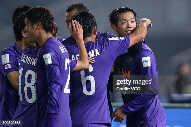 Tsukasa Shiotani of Sanfrecce Hiroshima celebrates with teammates after scoring a goal during FIFA Club World Cup: Play-off match for the quarter...