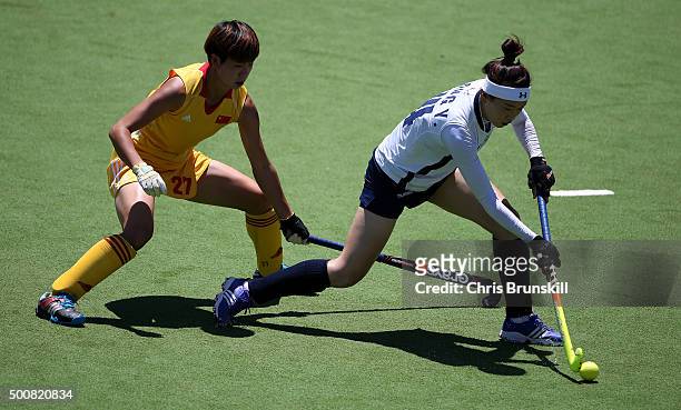 Qian Yu of China competes with Yoo Jin Hong of Korea during the quarter final match between China and Korea on day 6 of the Hockey World League Final...