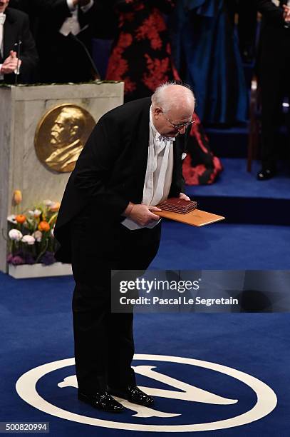 Professor Angus Deaton, laureate of the Nobel Prize in Economic Sciences acknowledges applause after he received his Nobel Prize from King Carl XVI...