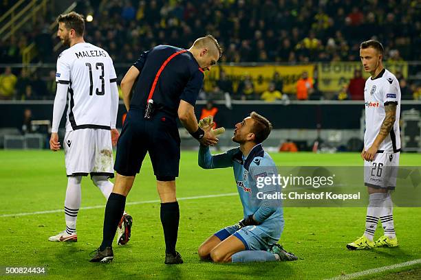 Referee Mattias Gestraninus of Finland tlks to Panagiotis Glykos of PAOK FC during the UEFA Europa League group C match between Borussia Dortmund and...