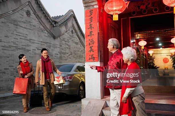 family on chinese new year - chinese car home stockfoto's en -beelden