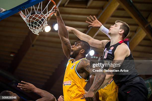 Will Daniels, #6 of Limoges CSP competes with Nikola Milutinov, #11 of Olympiacos Piraeus during the Turkish Airlines Euroleague Basketball Regular...