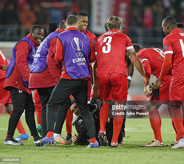 Didier Tholot manager of FC Sion is dropped while celebrating at the end of the UEFA Europa League match between FC Sion and Liverpool FC at Estadio...