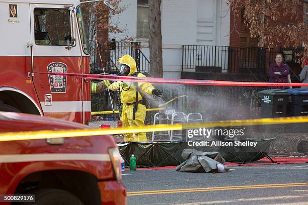 Personnel are decontaminated as fire and hazmat crews investigate a suspicious letter delivered to the Council on American-Islamic Relations on...