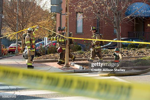 Fire and hazmat crews arrive on the scene to investigate a suspicious letter delivered to the Council on American-Islamic Relations on December 10,...