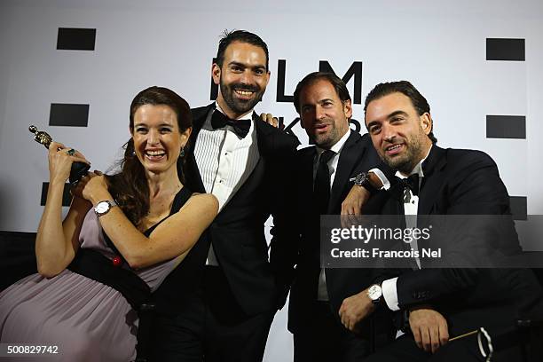 Deborah Jossa poses with a guest, Adrian Jossa and the owner of The Clinic Karim Fekih during the IWC Filmmaker Award Night 2015 at The One & Only...