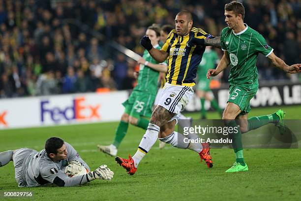 Fernandao of Fenerbahce vies for the ball with Celtic's goalkeeper Craig Gordon and Jozo Simunovic during the UEFA Europa League Group A soccer match...