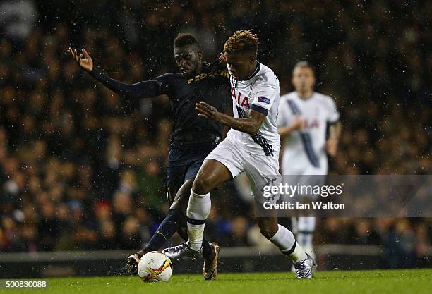 Joshua Onomah of Spurs is challenged by Tiemoue Bakayoko of Monaco during the UEFA Europa League Group J match between Tottenham Hotspur and AS...