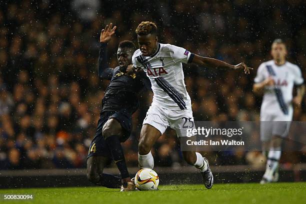 Joshua Onomah of Spurs is challenged by Tiemoue Bakayoko of Monaco during the UEFA Europa League Group J match between Tottenham Hotspur and AS...