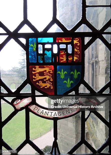 Coats of arms displayed on stained glass windows at Warwick castle