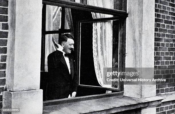 Adolf Hitler 1889-1945, German politician at a window receiving the adulation of a crowd in Bayreuth