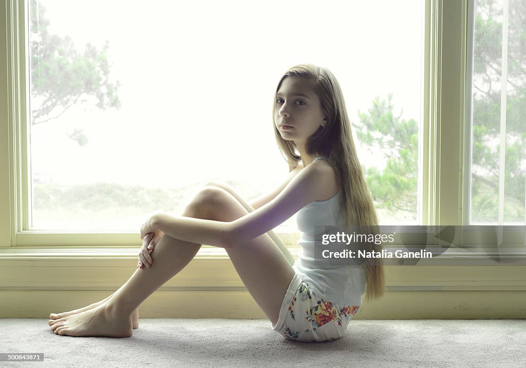 Teenage Girl Sitting By The Window High Res Stock Photo Getty Images teenage-girl-sitting-by-the-window-high-res-stock-photo-getty-images
