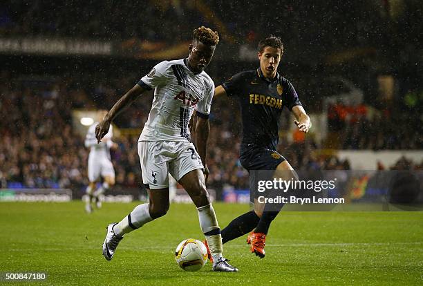 Joshua Onomah of Spurs is pursued by Mario Pasalic of Monaco during the UEFA Europa League Group J match between Tottenham Hotspur and AS Monaco at...