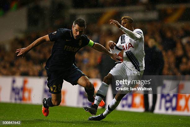 Jeremy Toulalan of Monaco fouls Clinton N'jie of Spurs, for which he receives the yellow card during the UEFA Europa League Group J match between...