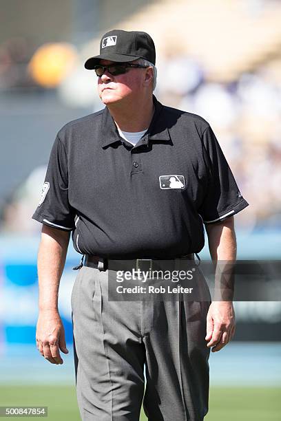 Umpire Tim Welke looks on during game between the Los Angeles Dodgers and the Colorado Rockies at Dodger Stadium on Sunday, April 19, 2015 in Los...