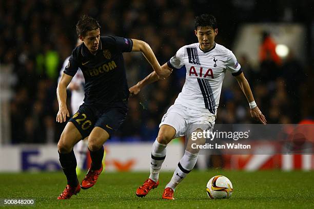 Son Heung-Min of Spurs is challenged by Mario Pasalic of Monaco during the UEFA Europa League Group J match between Tottenham Hotspur and AS Monaco...