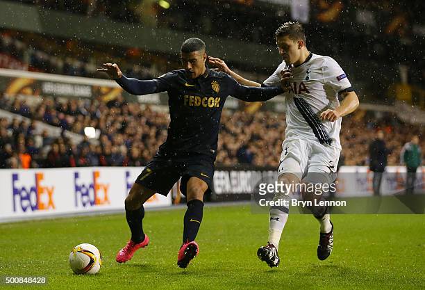 Nabil Dirar of Monaco holds off the challenge from Kevin Wimmer of Spurs during the UEFA Europa League Group J match between Tottenham Hotspur and AS...