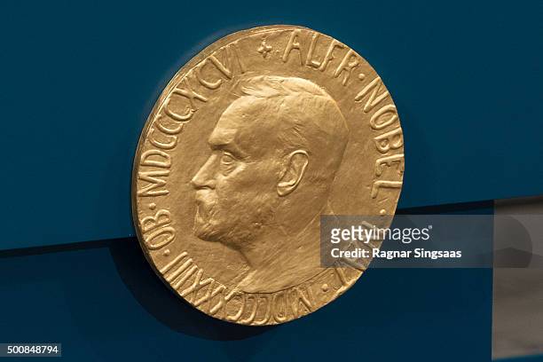Plaque depicting Alfred Nobel adorns the wall during the Nobel Peace Prize ceremony at Oslo City Town Hall on December 10, 2015 in Oslo, Norway.
